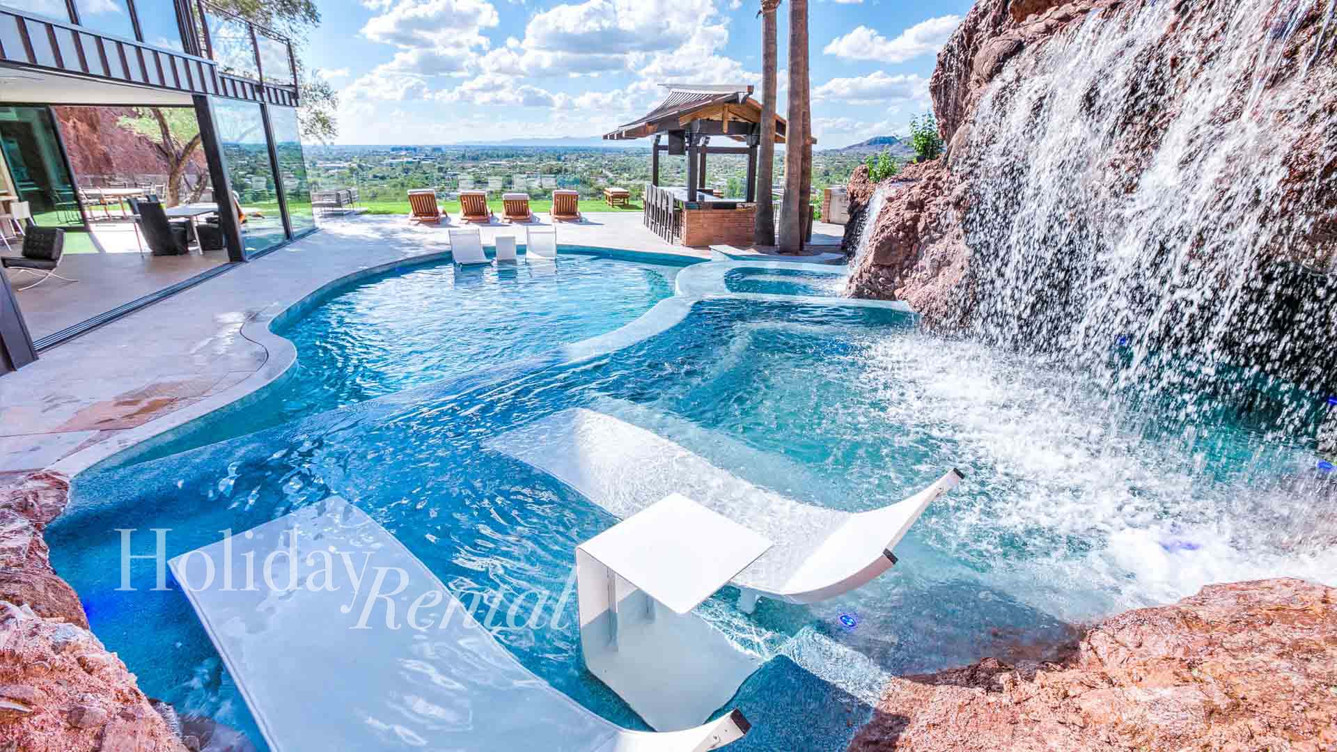 luxury vacation rental pool and spa with waterfall